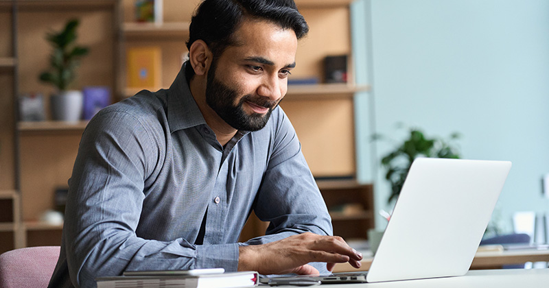 Man Doing Research on Pest Control Businesses  