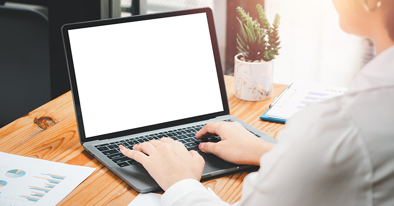 Woman typing on computer