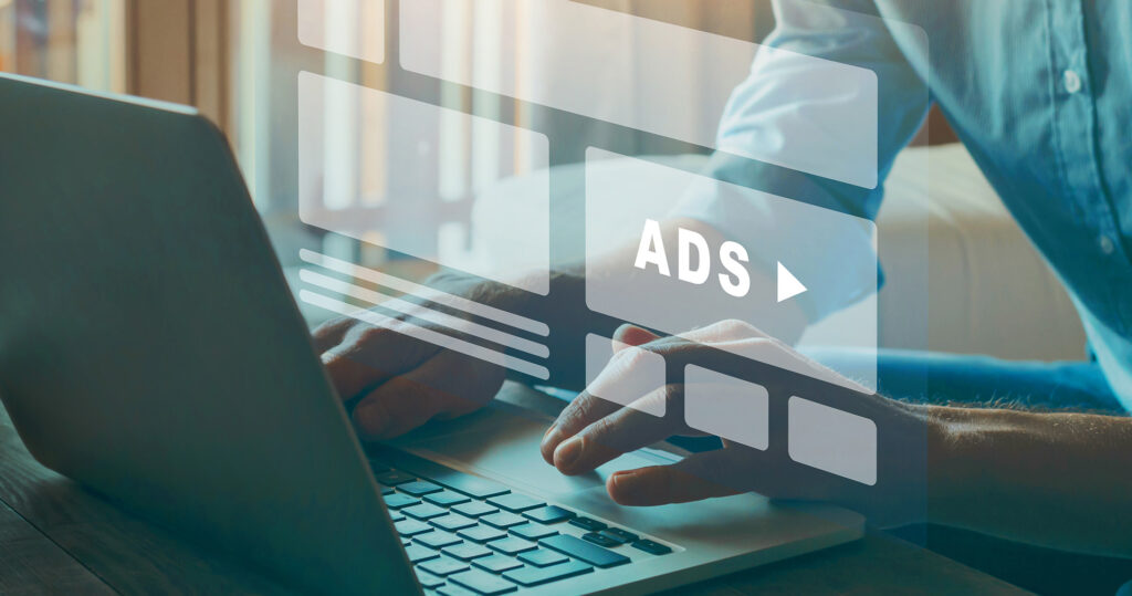 Ads overlay with man at computer