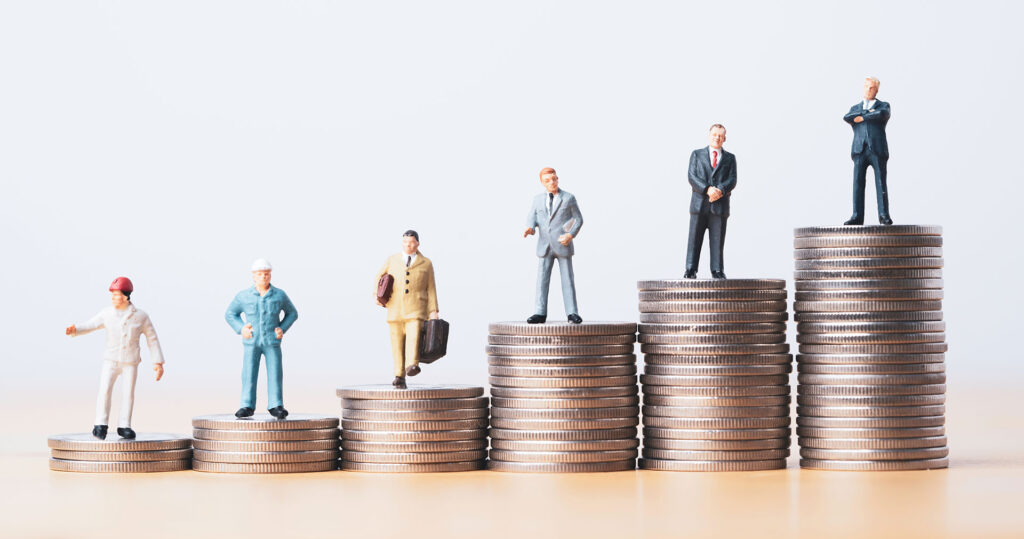 Mini-professional-worker-figures-standing-on-coin-piles,-salary-growth-concept