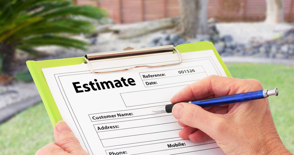 technician filling out lawn care estimates